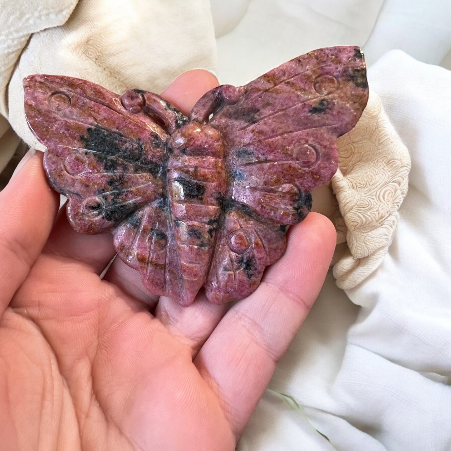 Icy rhodonite butterfly