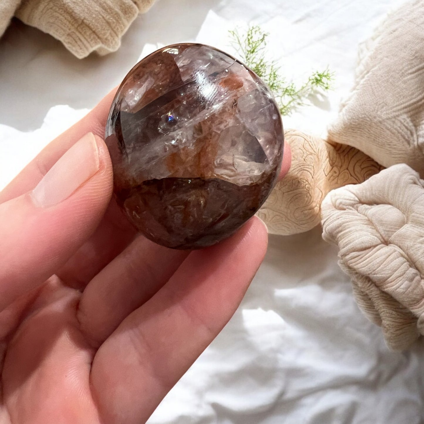 A grade Fire Quartz palmstone medium
