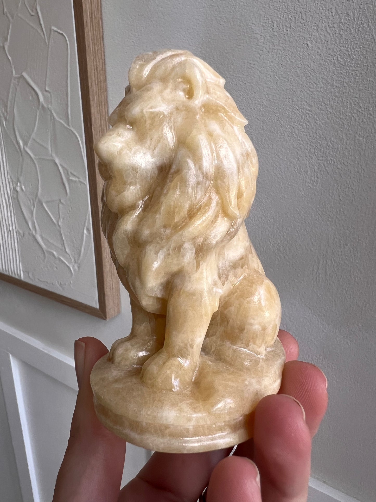 Calcite lion carving