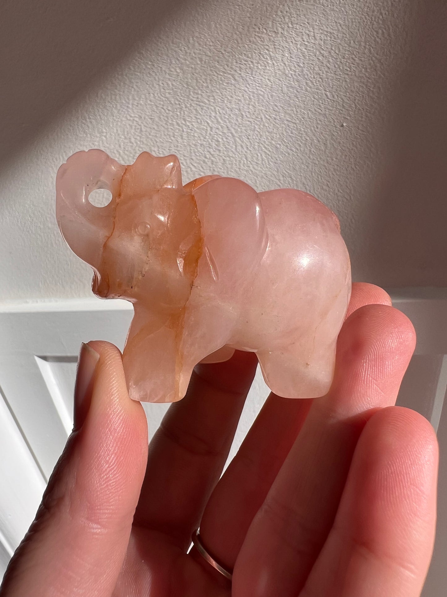 Rose quartz elephant with golden healer