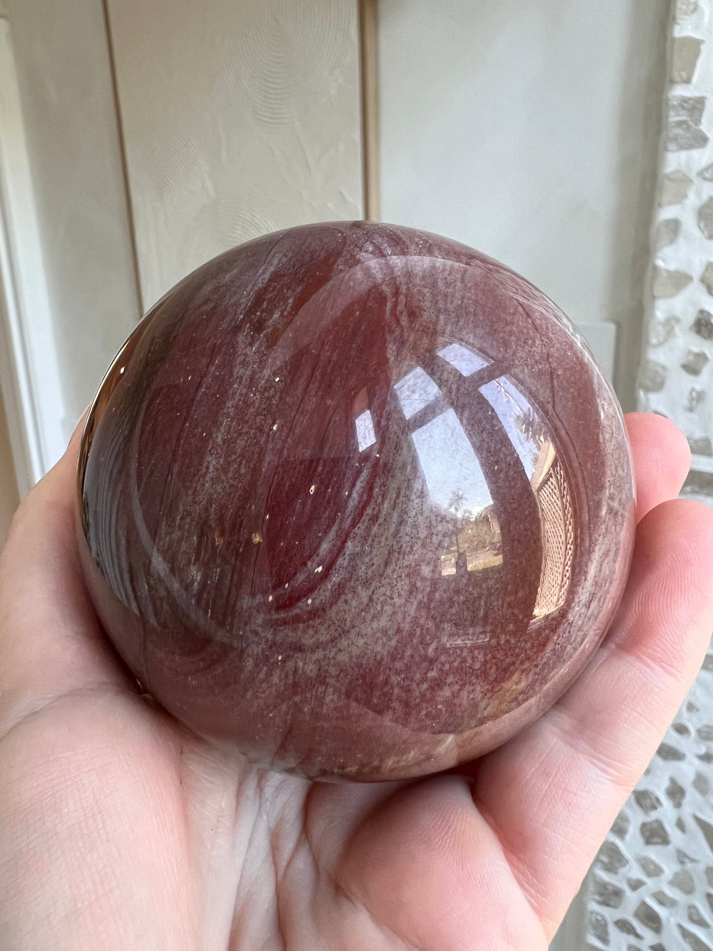 Large petrified wood sphere