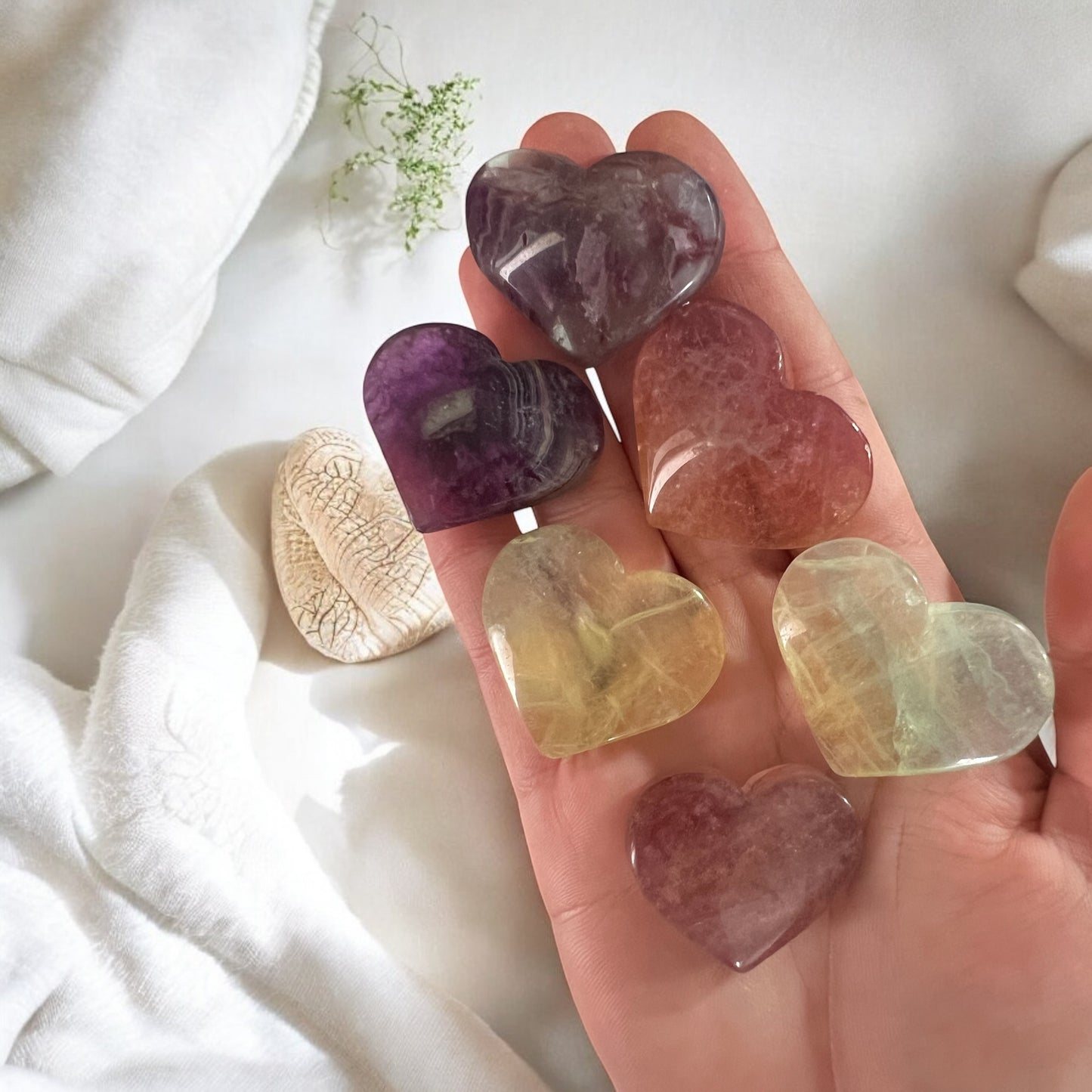 Fluorite heart carvings intuitively chosen