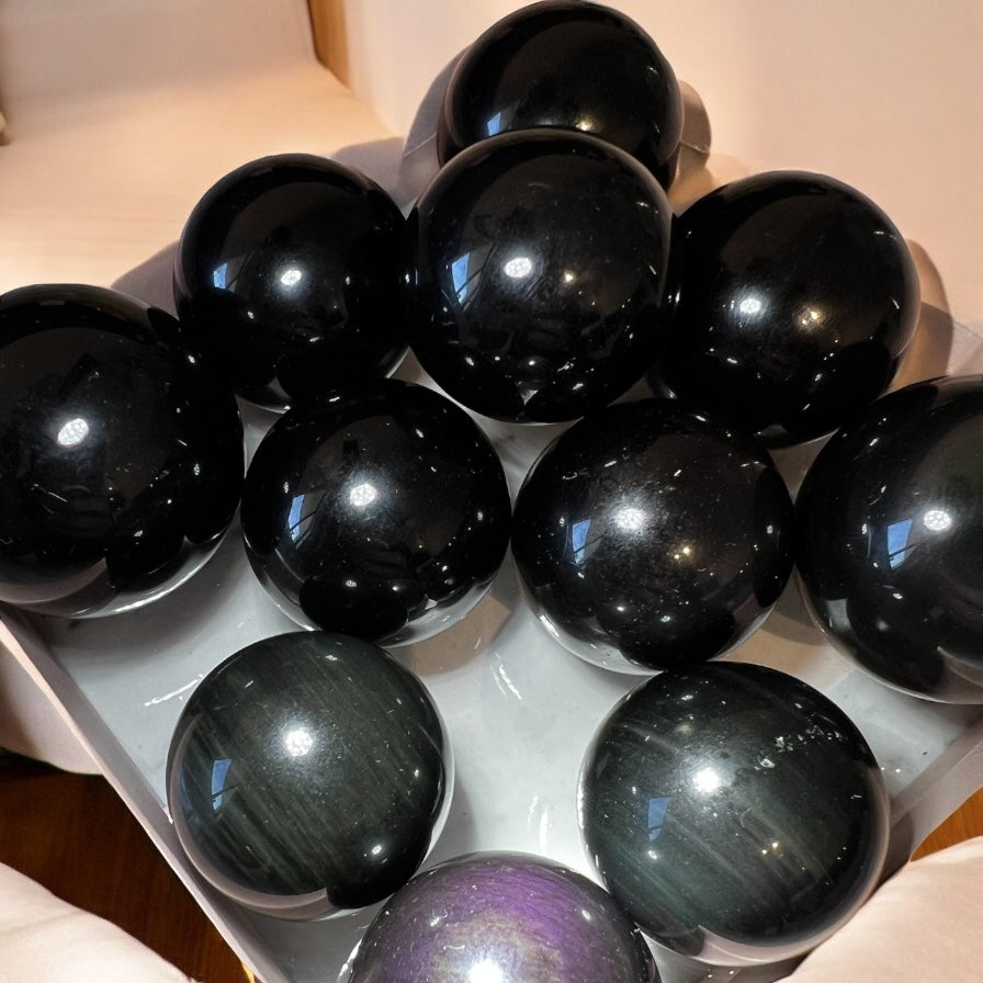 Rainbow obsidian sphere