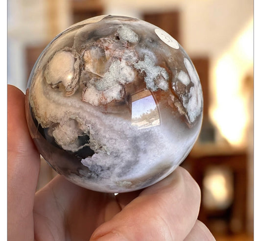 Black flower agate sphere