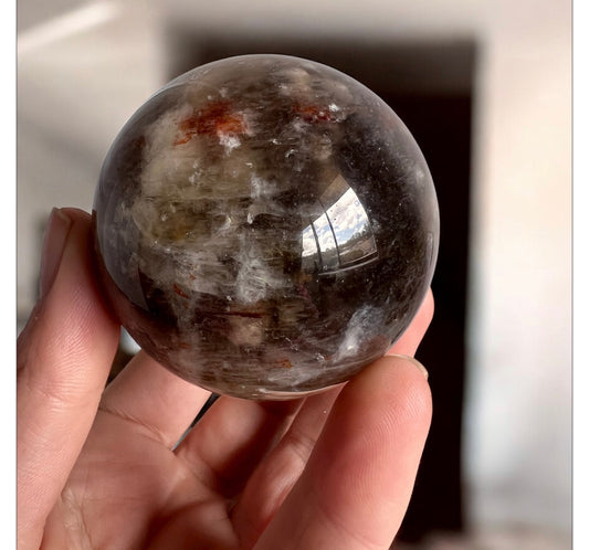 Fire quartz mixed Smokey sphere