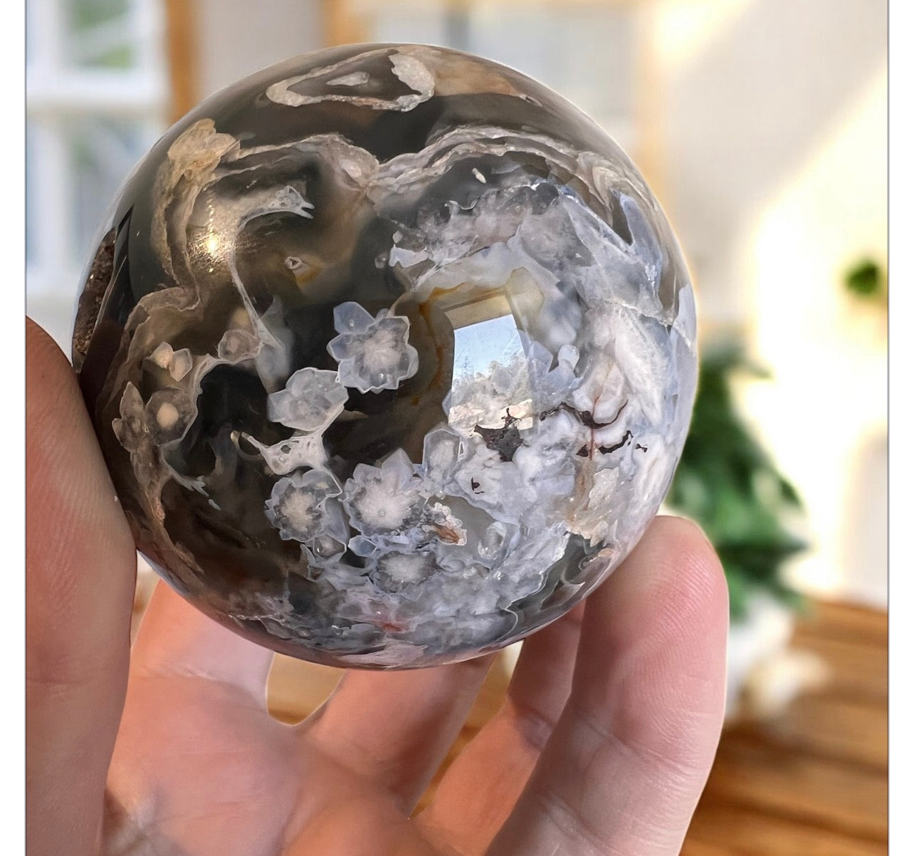 Black flower agate sphere