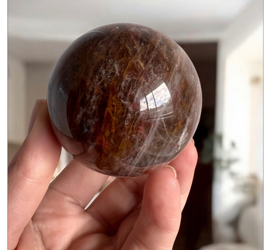 Fire quartz mixed Smokey sphere