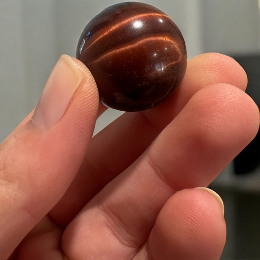 Red tigers eye sphere