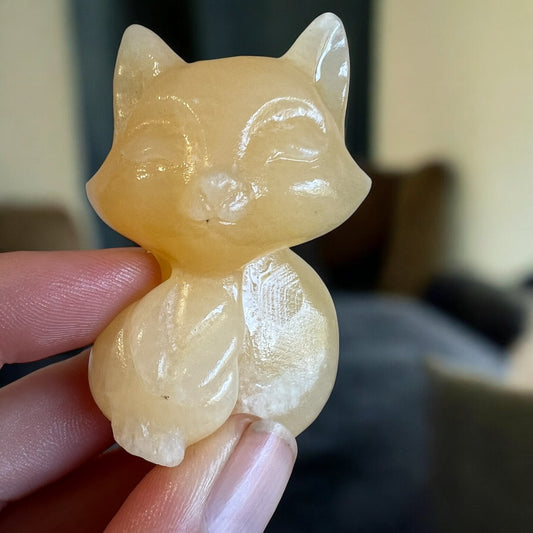 Calcite fox carving