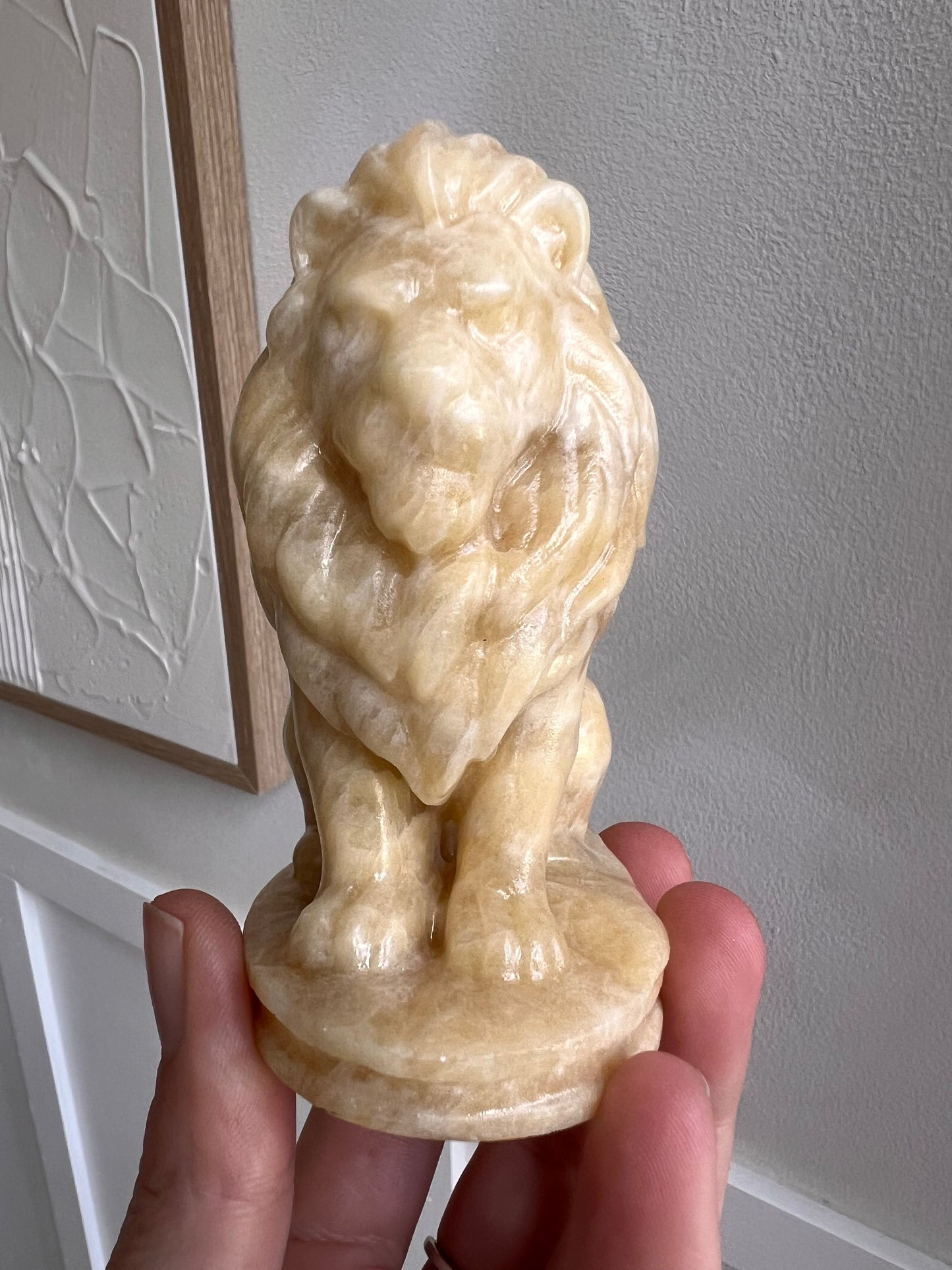 Calcite lion carving