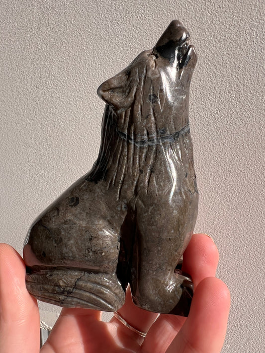 Volcano agate wolf carving