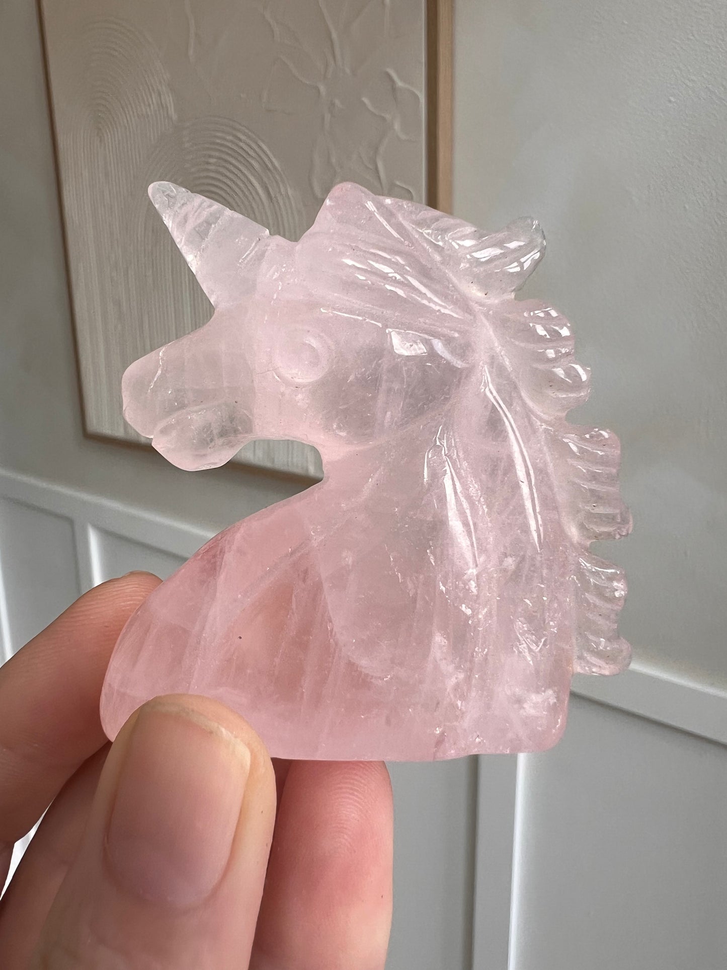 Rose quartz unicorn carving