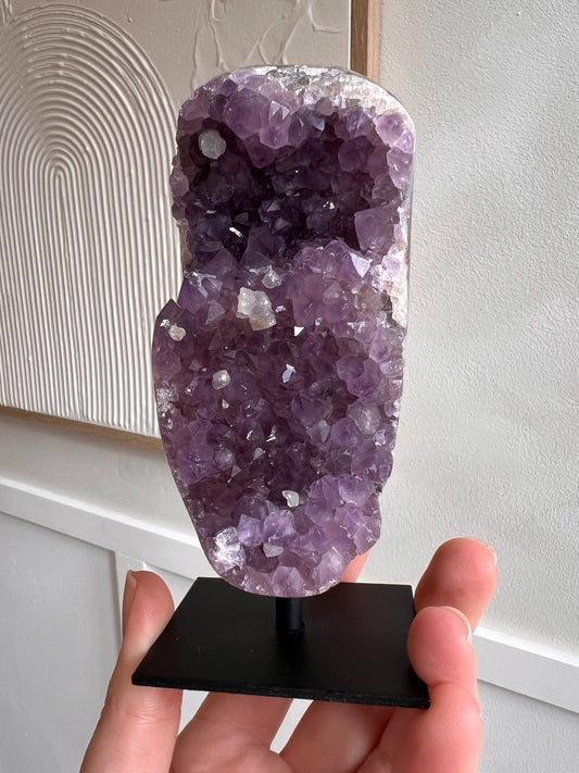 Brazilian amethyst on stand with calcite