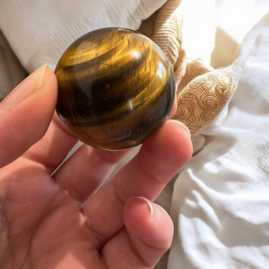 Small tigers eye sphere super flashy