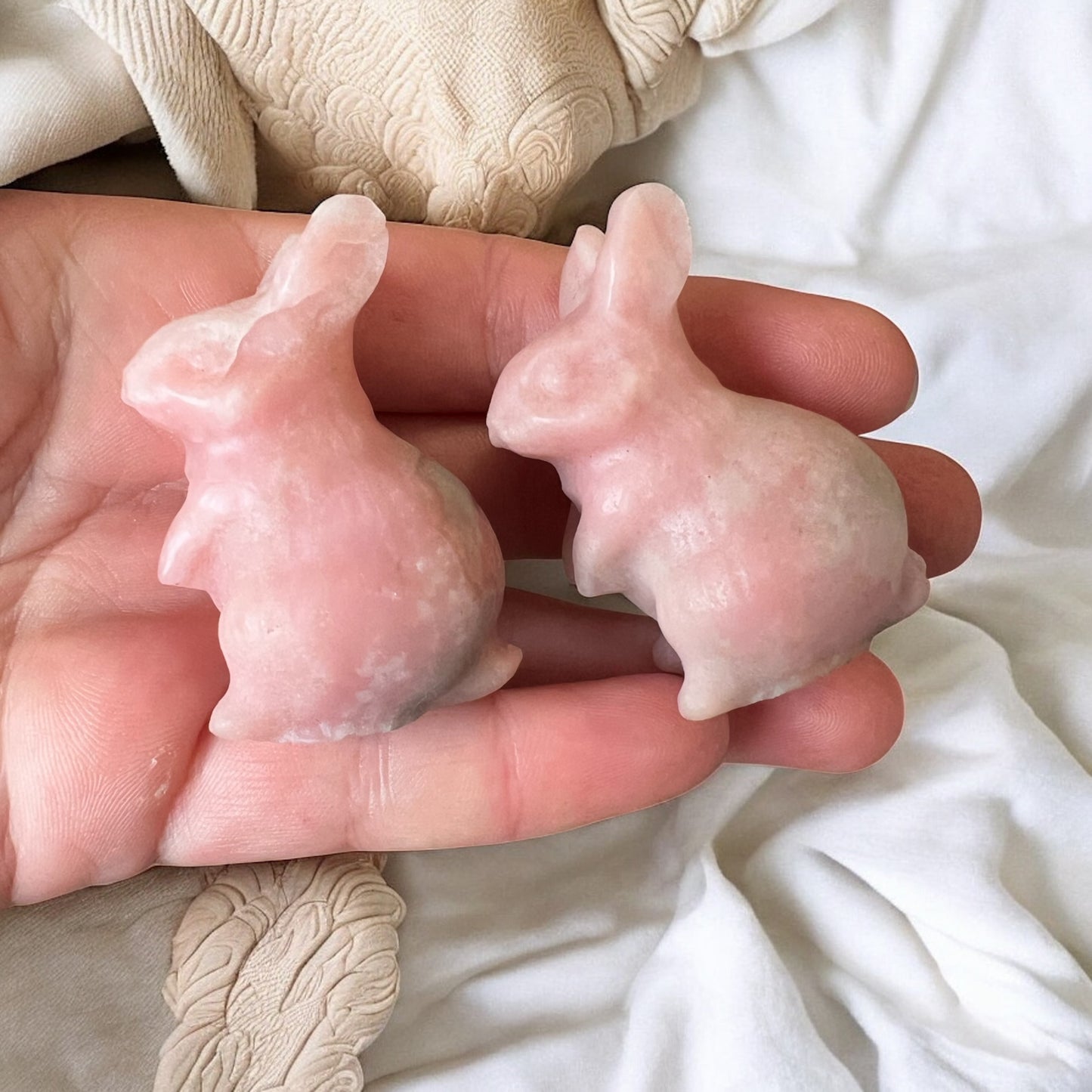 Pink opal bunny carvings intuitively chosen